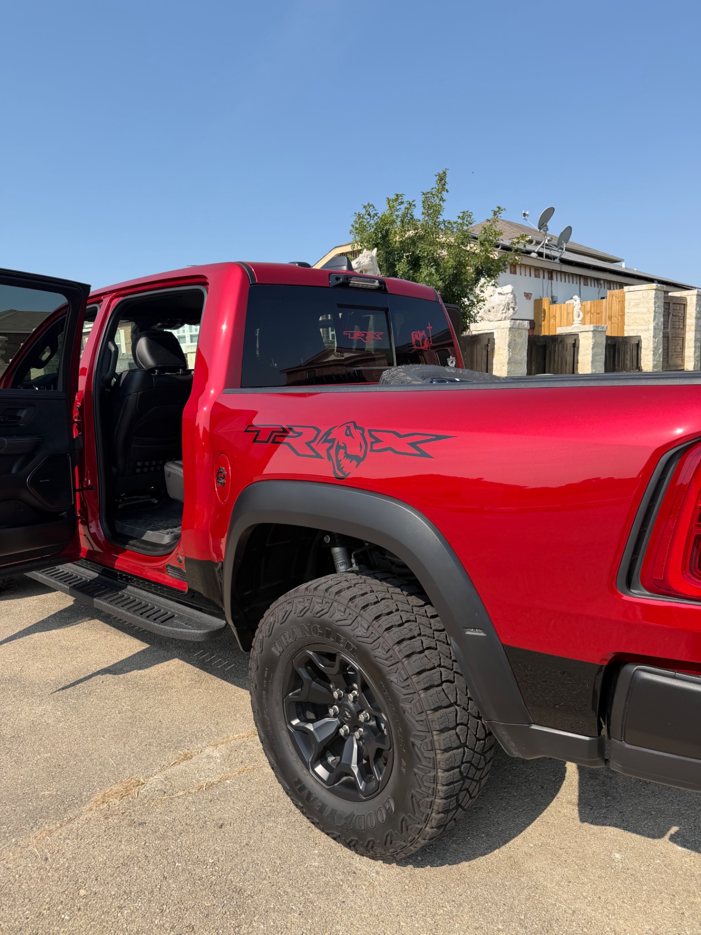 Rear three-quarter view showing the TRX bed decal