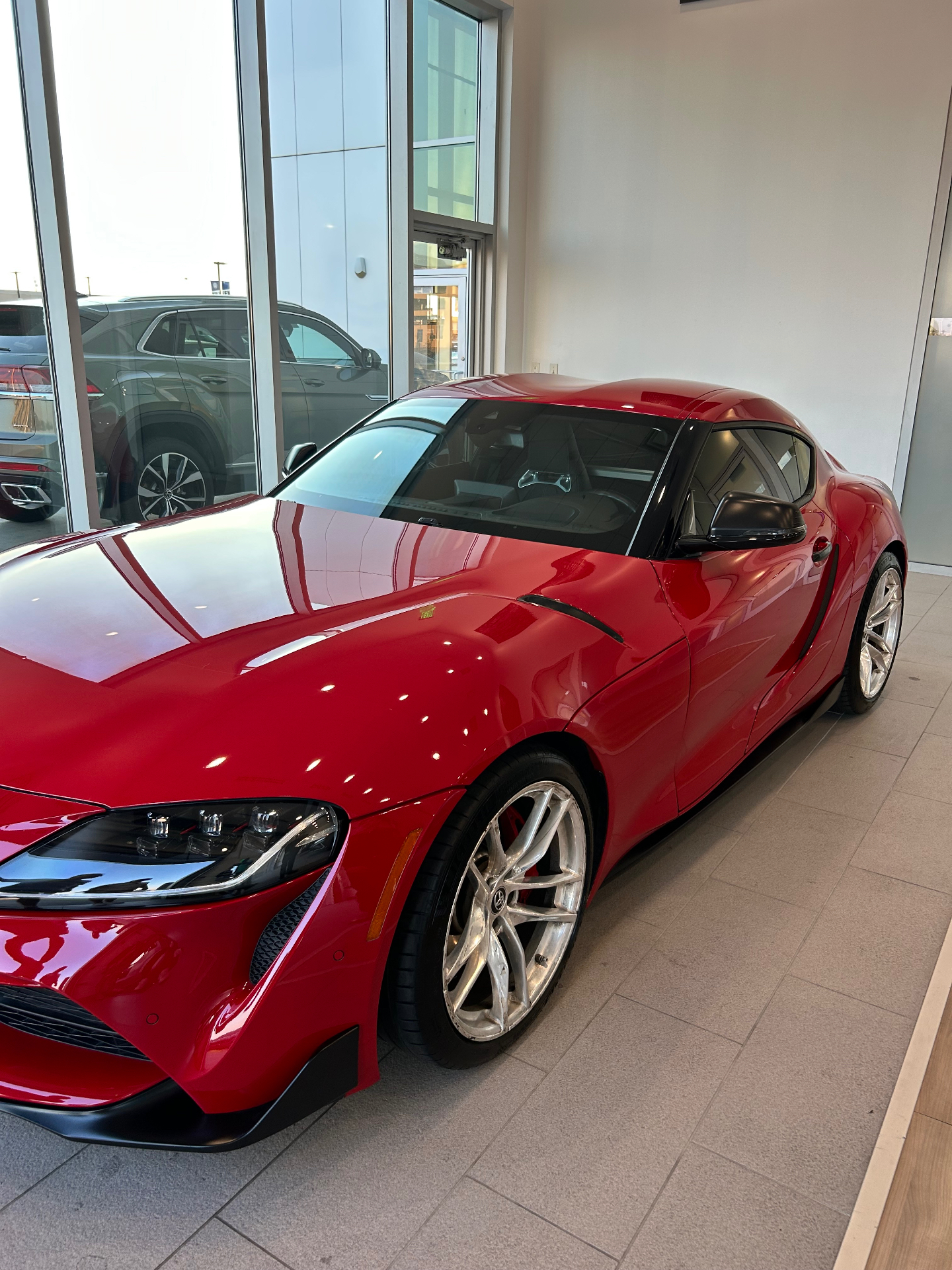 Front three-quarter of the red Toyota GR Supra