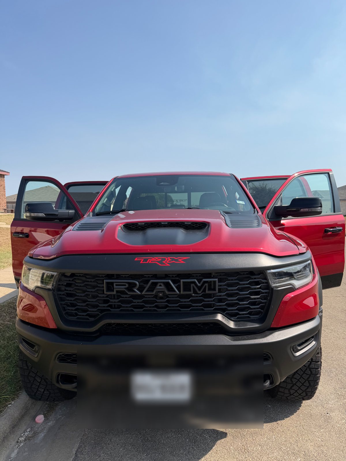 Front grille of the Flame Red Ram 1500 TRX